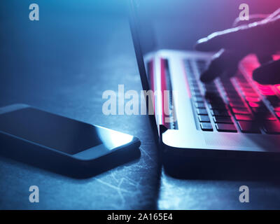 A man working on laptop at night Stock Photo