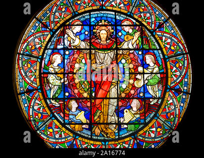 London, England UK. Church of St Michael, Cornhill. Stained glass window: Christ In Majesty (Clayton and Bell; 1859) Stock Photo