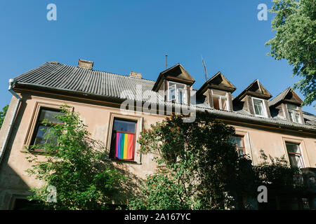Low angle view of residential building against clear blue sky in city Stock Photo