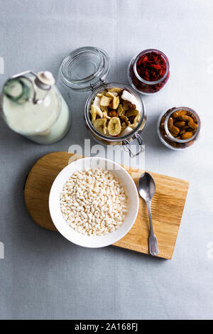 Bowl of puffed rice and muesli ingredients seen from above Stock Photo