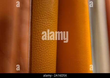 Textile fabrics of orange colors Stock Photo