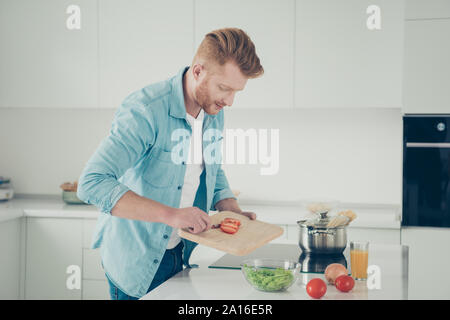 Profile side view good-looking good-wearing man in denim jeans s Stock Photo