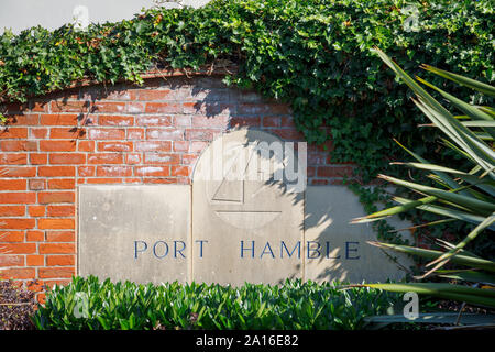 Stone engraved with the name of Port Hamble at the marina entrance, Hamble-le-Rice, a coastal village in the Solent, Hampshire, south coast England Stock Photo