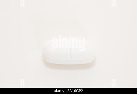 white pills. medical background - Image Stock Photo