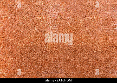 Texture with rose gold sparkles on surface. Stock Photo
