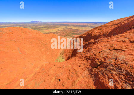 Uluru, Northern Territory, Australia - Aug 23, 2019: aerial view from the top of Uluru-Kata Tjuta National Park. Climbing to Uluru summit. In the Stock Photo