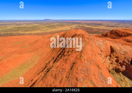 Uluru, Northern Territory, Australia - Aug 23, 2019: aerial view from the top of Uluru-Kata Tjuta National Park. Climbing to Uluru summit. On Stock Photo