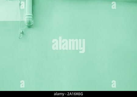 Wall colored with mint or green color. Stock Photo