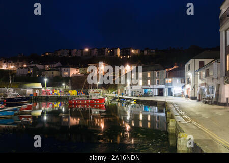 Mevagissey harbour at night time the village is within the Cornish Area of Outstanding Natural Beauty Stock Photo