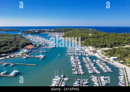 An aerial shot of Verudela peninsula with yachts and boats in Pula, Istria, Croatia Stock Photo