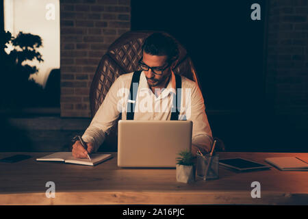 Concentrated focused trendy bristle man spectacles formal wear s Stock Photo