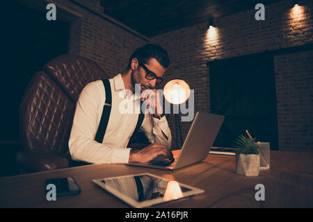 Low angle top view ceo investor entrepreneurtrendy bristle man i Stock Photo