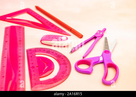 Pink school supplies on the table for girls Stock Photo
