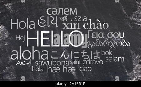 Hello text on Different languages chalk writing on chalkboard Stock Photo