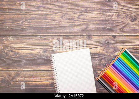 School concept - Different school supplies on the wooden table Stock Photo