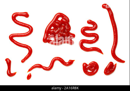 Ketchup splashes isolated on white background. Tomato sauce. Top view, flat lay Stock Photo