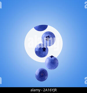 Fresh falling blueberries isolated on trendy colored background Stock Photo
