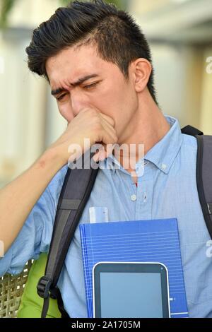 Stressed Youthful Boy Student With Notebooks Stock Photo