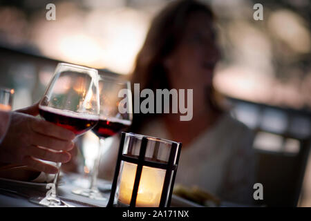 Two glasses of red wine on a restaurant table. Stock Photo