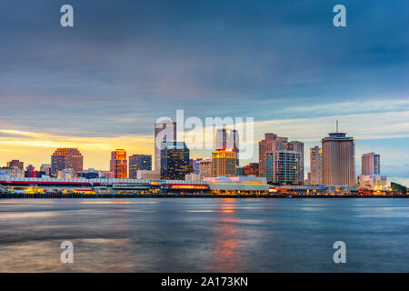 New Orleans, Louisiana, USA night skyline on the Mississippi River at dusk. Stock Photo