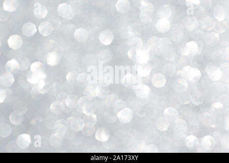 Abstract silver glitter background. Sparkle silver bokeh christmas background. Stock Photo