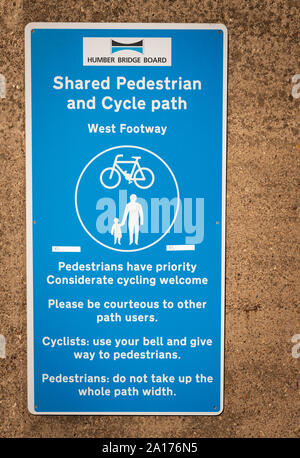 Share the path signage on footpath Stock Photo - Alamy