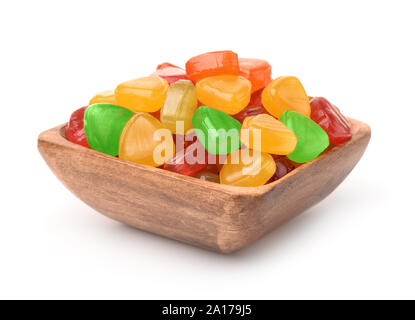 Colorful hard candies in wooden bowl isolated on Stock Photo
