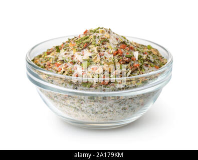 Bowl of mixed aromatic salt, spices and herbs isolated on white Stock Photo