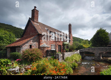 Stone cottage and bridge at Allerford village. Exmoor National Park. Somerset. UK. Stock Photo