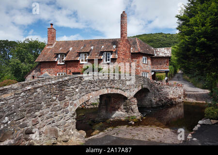 Bridge, ford and cottage at Allerford village. Exmoor National Park. Somerset. UK. Stock Photo