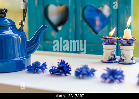 Blue vintage ceramic teapot and teacup. Tea and coffee concept Stock Photo