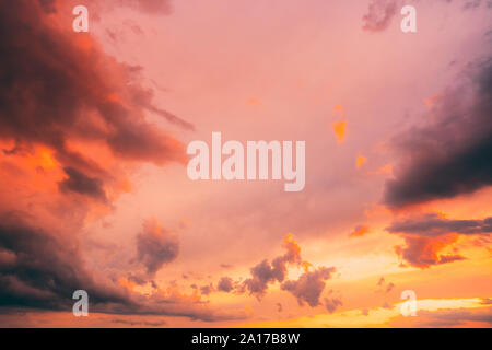 Amazing Natural Bright Dramatic Sky In Different Colours During Sunset Sunrise Time.  Colorful Sky Background. Beauty In Nature. Stock Photo