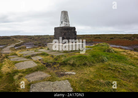 The trig point on the top of The Cheviot in Northumberland UK Stock Photo