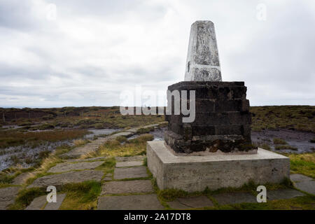 The trig point on the top of The Cheviot in Northumberland UK Stock Photo