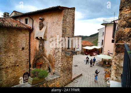 Piazza Medicea, showing Porta Medicea (left), in Santo Stefano di Sessanio in the Gran Sasso, Abruzzo, Italy. Stock Photo