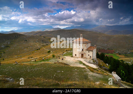 The Church of Santa Maria della Pietà below Rocca Calascio, the highest fortress in the Apennines, Abruzzo, Italy. Stock Photo