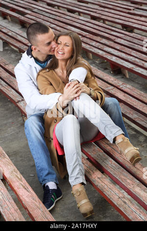 Couple kissing at the park bench, Rome Stock Photo - Alamy