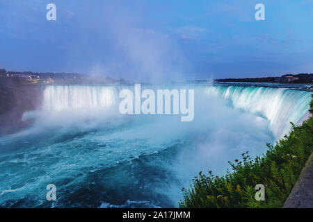 Niagara Falls seen at dusk from Canada Stock Photo