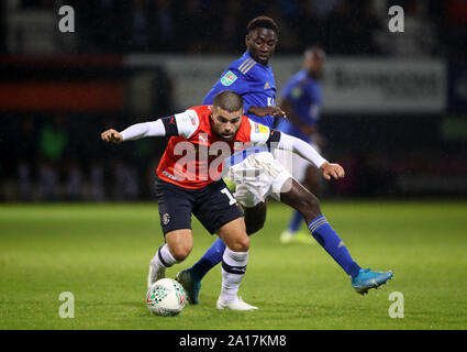 Luton Town's Elliot Lee and Leicester City's Wilfred Ndidi during the Carabao Cup, Third Round match at the Kenilworth Road, Luton. Stock Photo