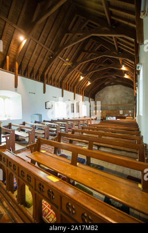 St Cenydd’s Church, Llangennith , a 12th century church on the site of a 6th century llan, or churchyard, which retains the original circular footprint. Llangennith, Gower Wales UK Stock Photo