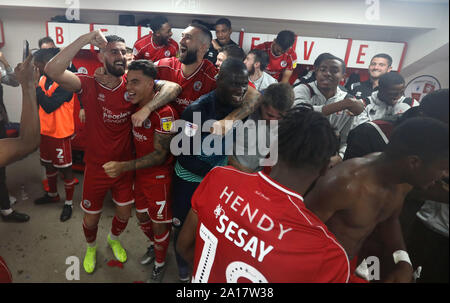 Crawley, UK. 24 September 2019 Crawley Town players celebrate after winning the Carabao Cup third round match between Crawley Town and Stoke City at the Peoples Pension Stadium in Crawley. Credit: Telephoto Images / Alamy Live News Stock Photo