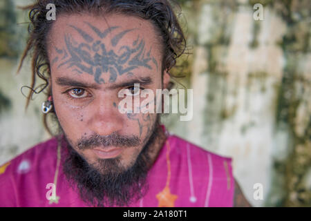 Man tattooed in the face Stock Photo