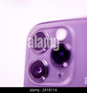 Paris, France - Sep 20, 2019: Super close-up macro details of new latest Apple Computers iPhone 11 Pro and 11 Pro Max smartphone triple-lens -focus with tilt-shift lens on three rear objectives Stock Photo