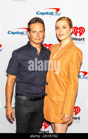 Scott Wolf and Kennedy McMann arrive for the iHeartRadio Music Festival