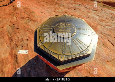 Uluru, Northern Territory, Australia - Aug 23, 2019: a cairn on top of the sacred site of Uluru-Kata Tjuta National Park at the end of trekking of Stock Photo