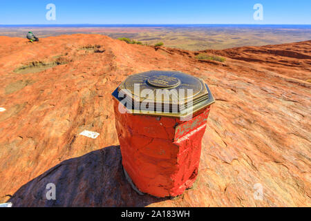 Uluru, Northern Territory, Australia - Aug 23, 2019: a cairn on top of the sacred site of Uluru-Kata Tjuta National Park at the end of trekking of Stock Photo