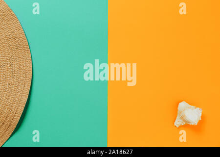 Overhead view of beach accessories on the bright colorful duotone background in trendy colors Stock Photo