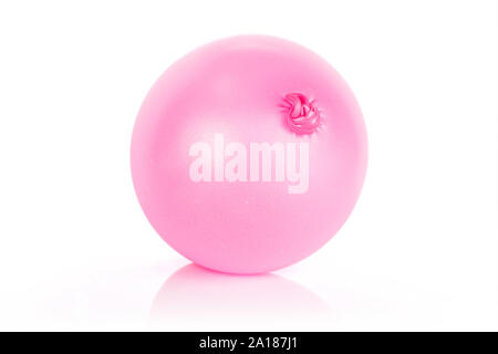 One whole pink latex pastel ballon isolated on white background Stock Photo