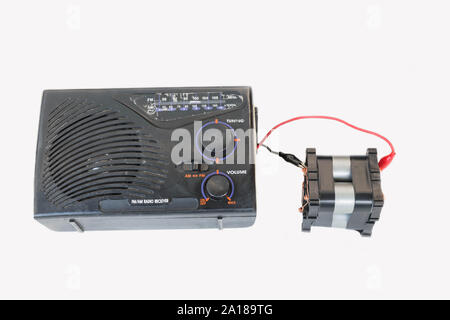 The old transistor radio, backup battery, Lithium phosphate battery power bank,DIY by yourself on the white background. Stock Photo