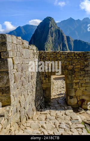 Machu Picchu sunrise, Sacred Valley of the Incas, Peru. Main gate, portal of the lost city, Huayna Picchu, Machu Pichu, early morning. Stock Photo